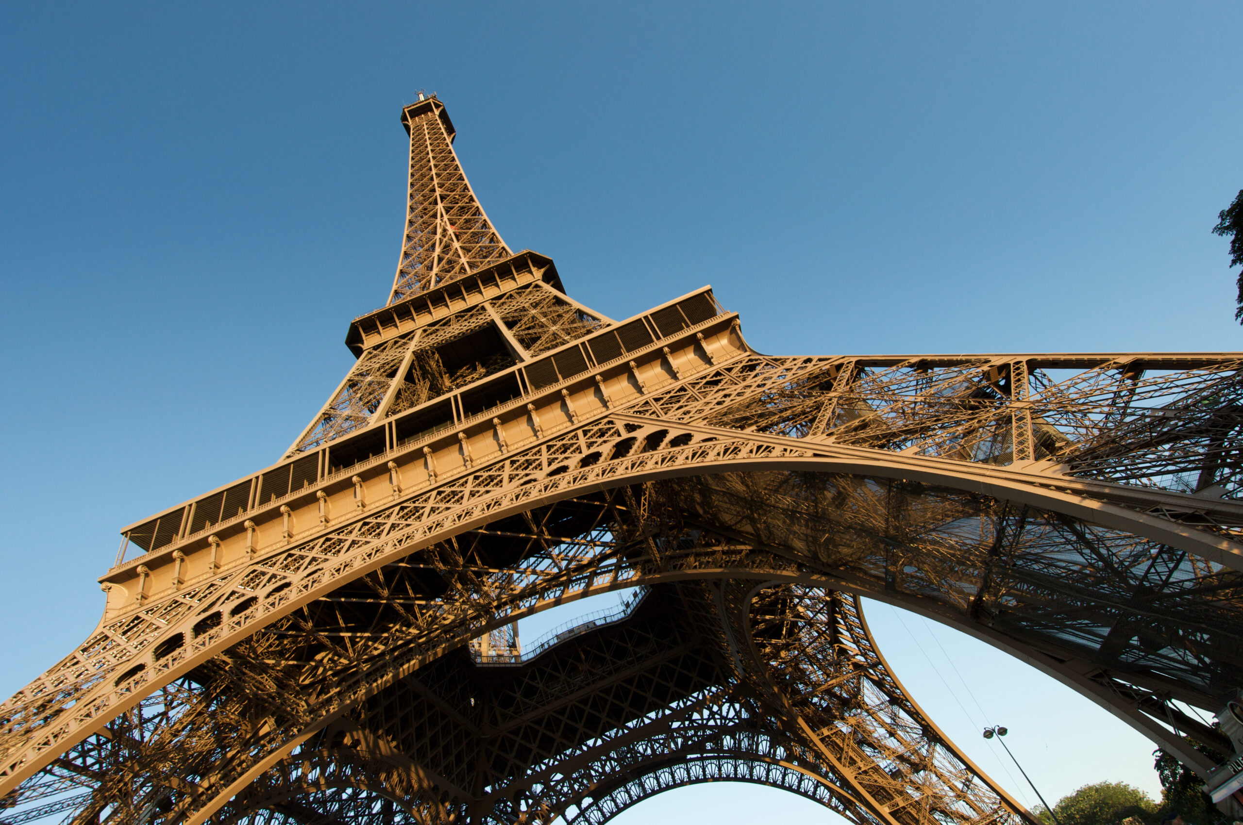 Low shot of Eiffel Tower on a sunny day in Paris