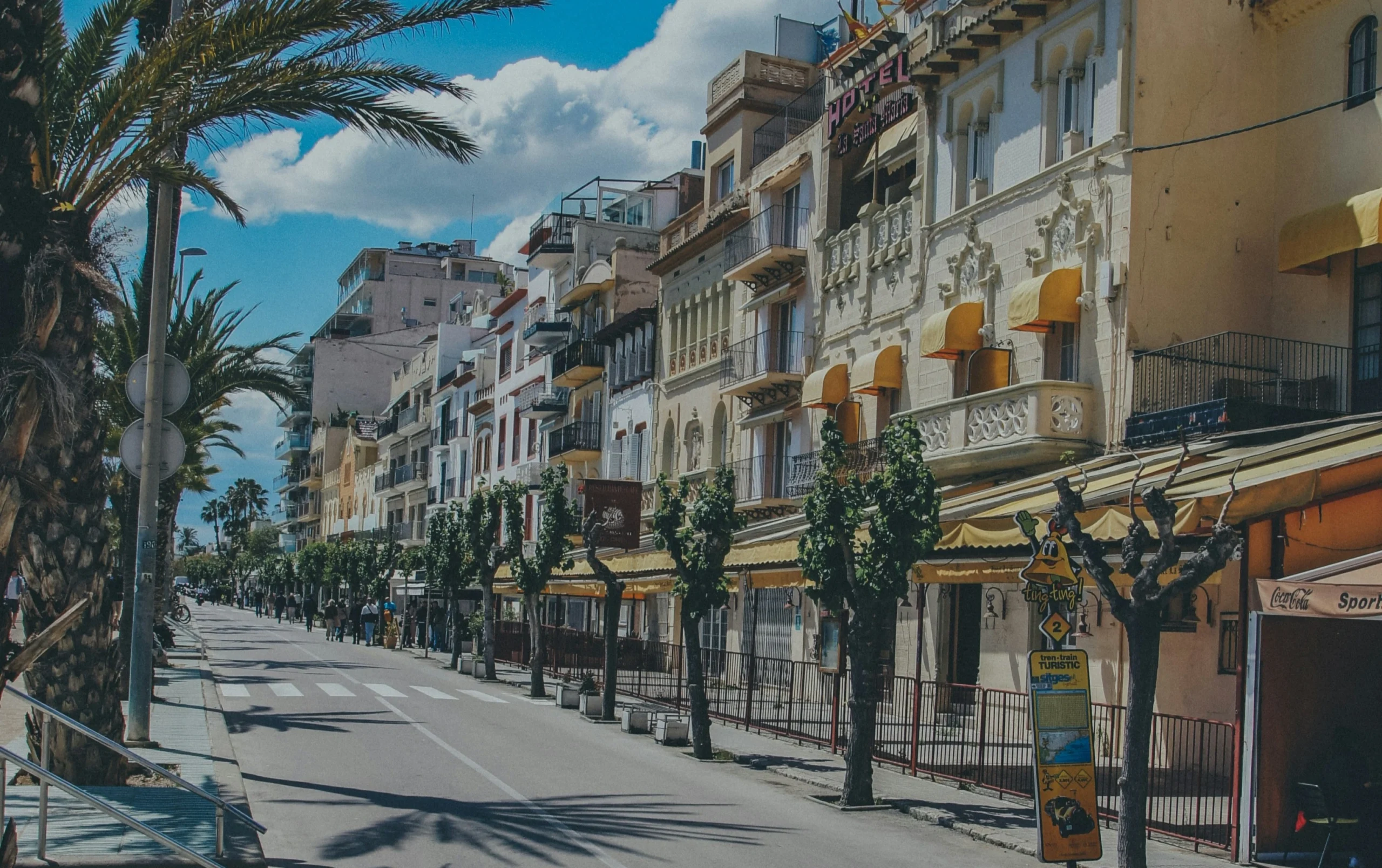 City lined street with palm trees in Sitges