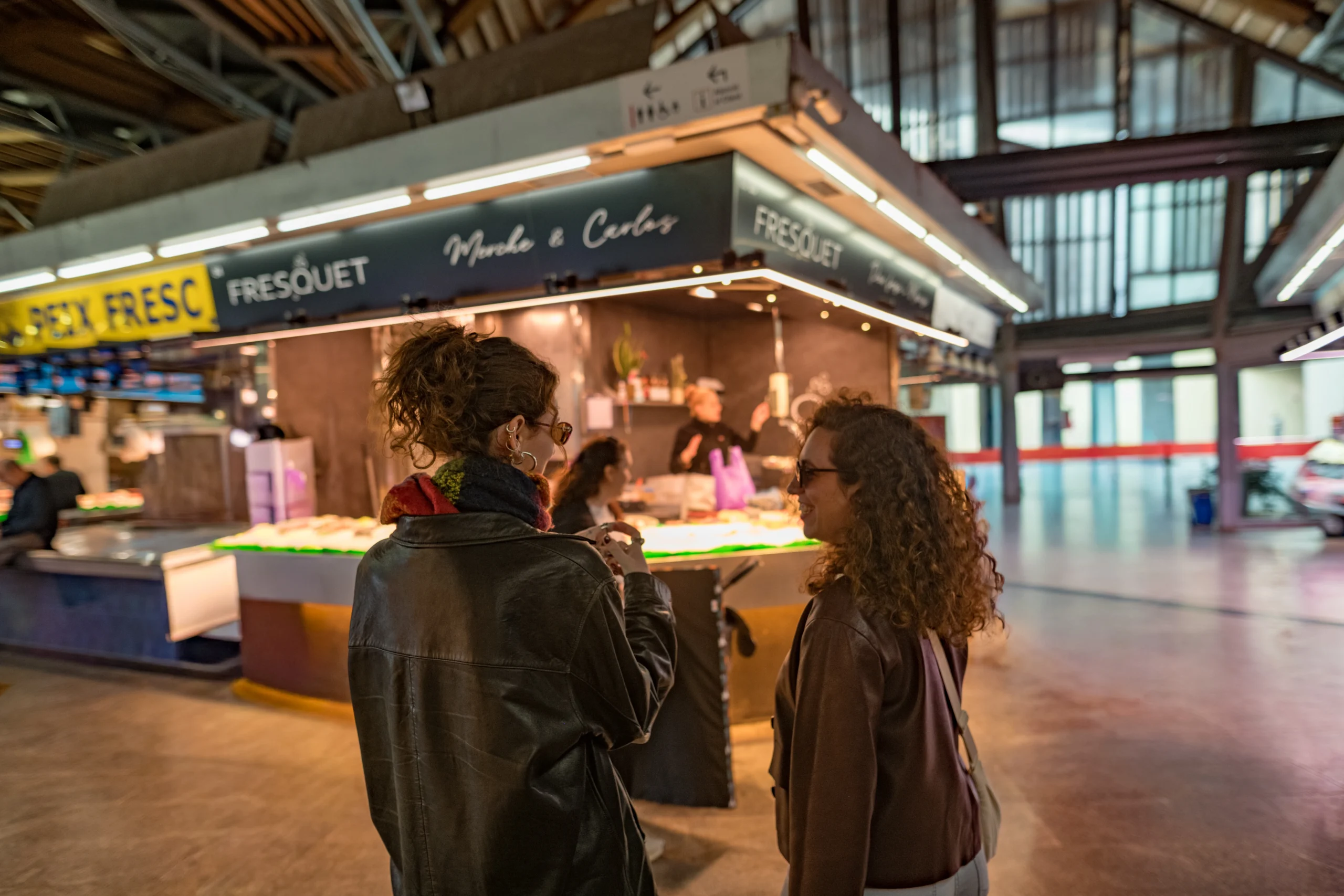 Guests chatting during premium Barcelona Markets tour