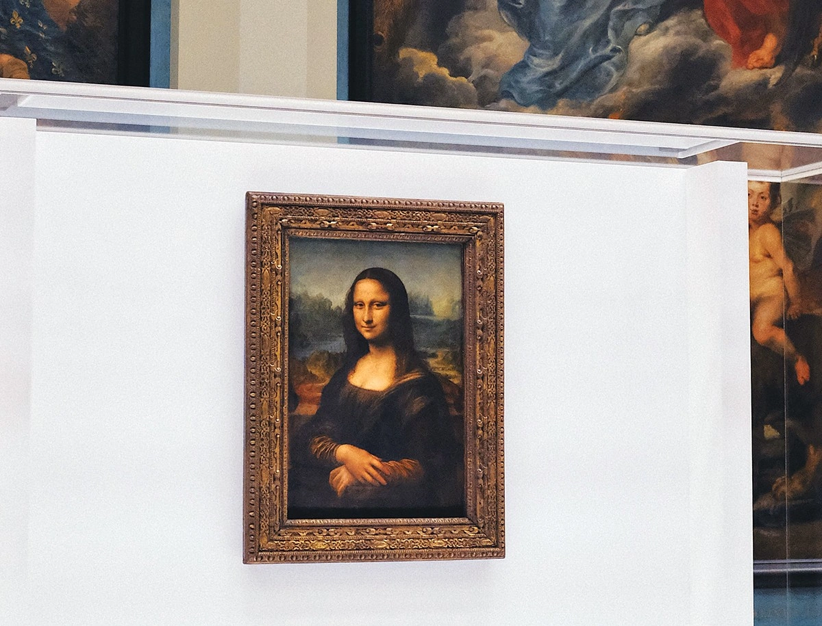 Mona Lisa at the Louvre with paintings in the background