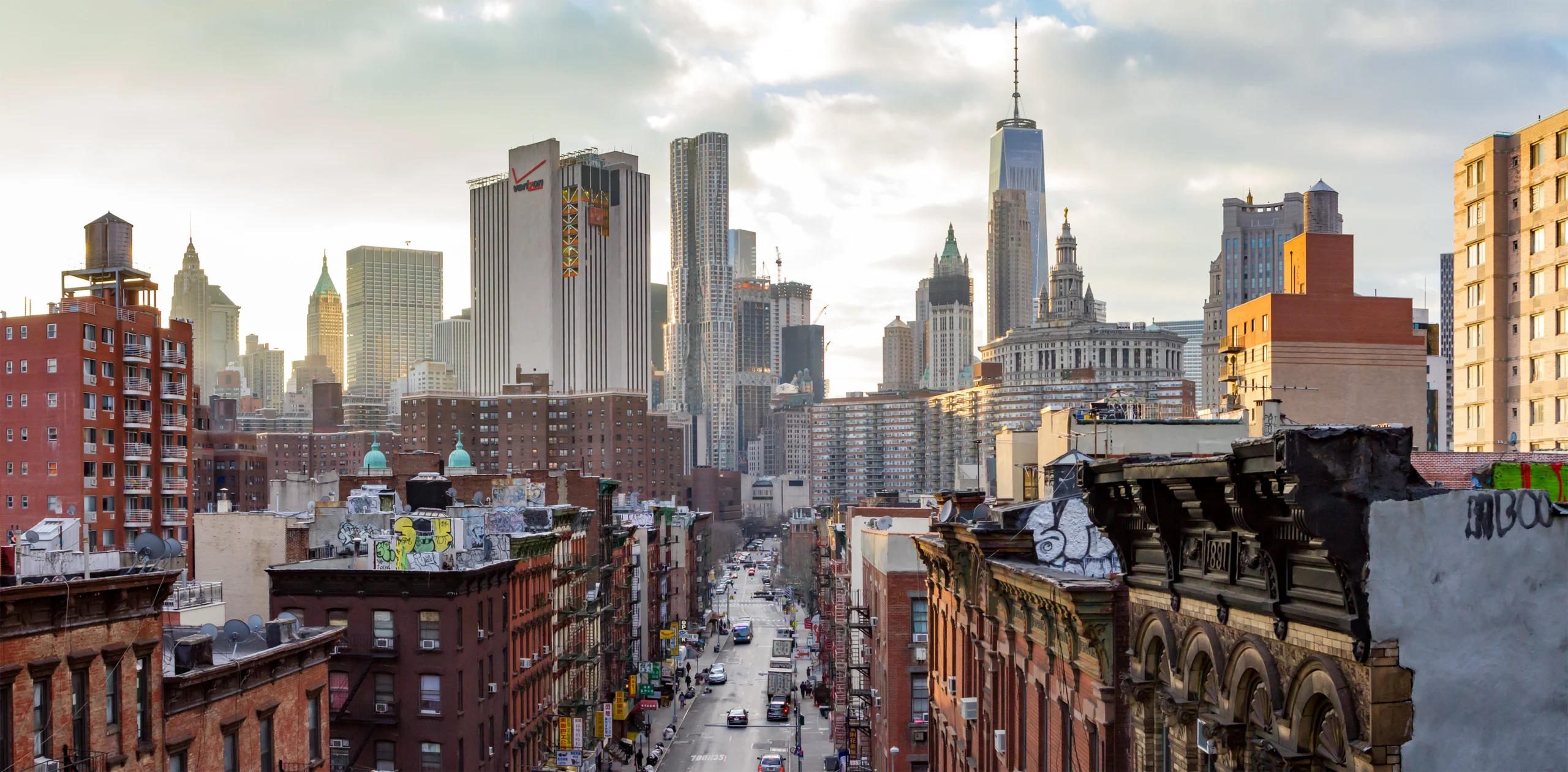 Panoramic view of the crowded buildings of the Manhattan skyline at sunset