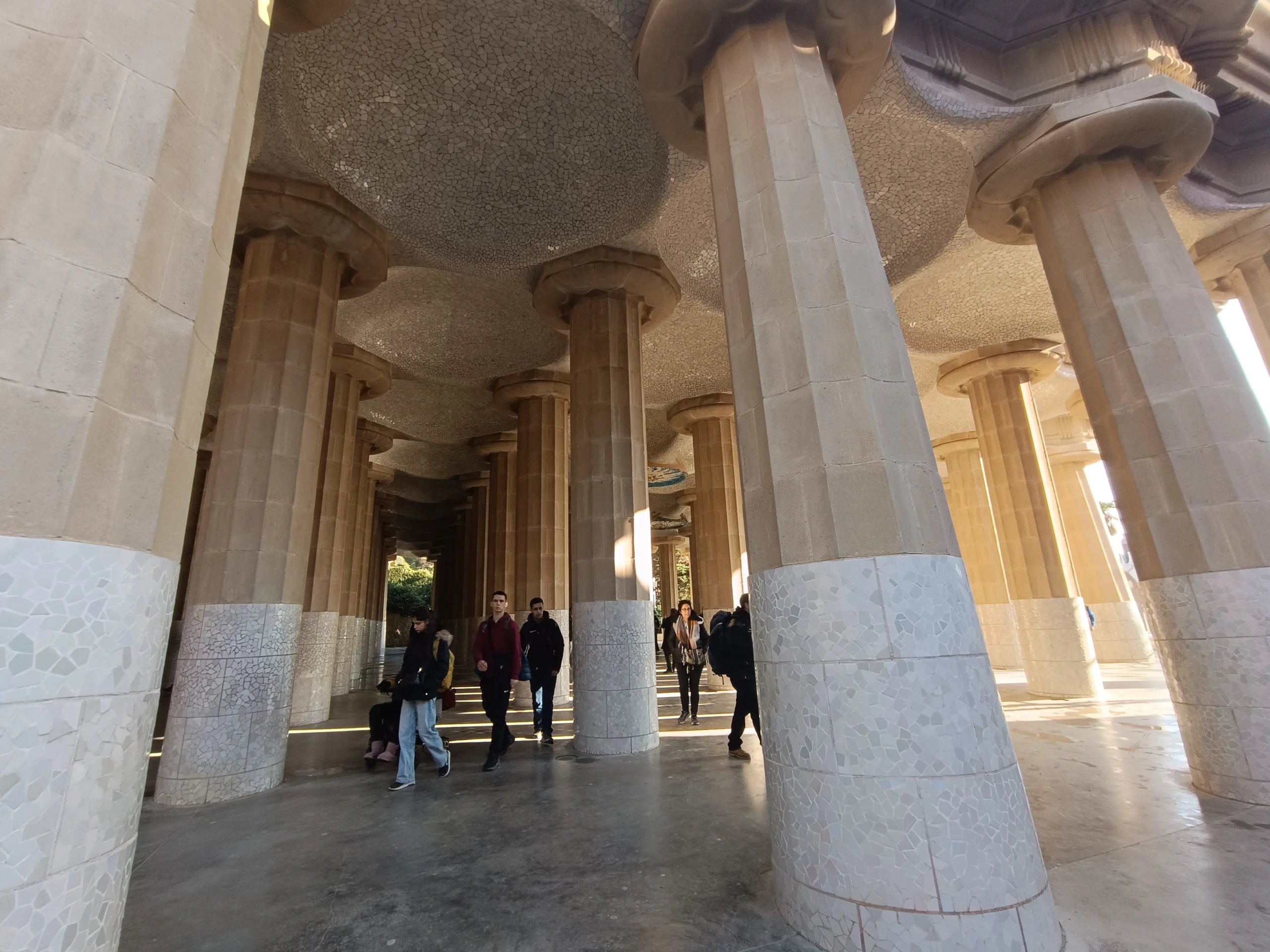 People walking through hypostile room during Park Guell guided experience
