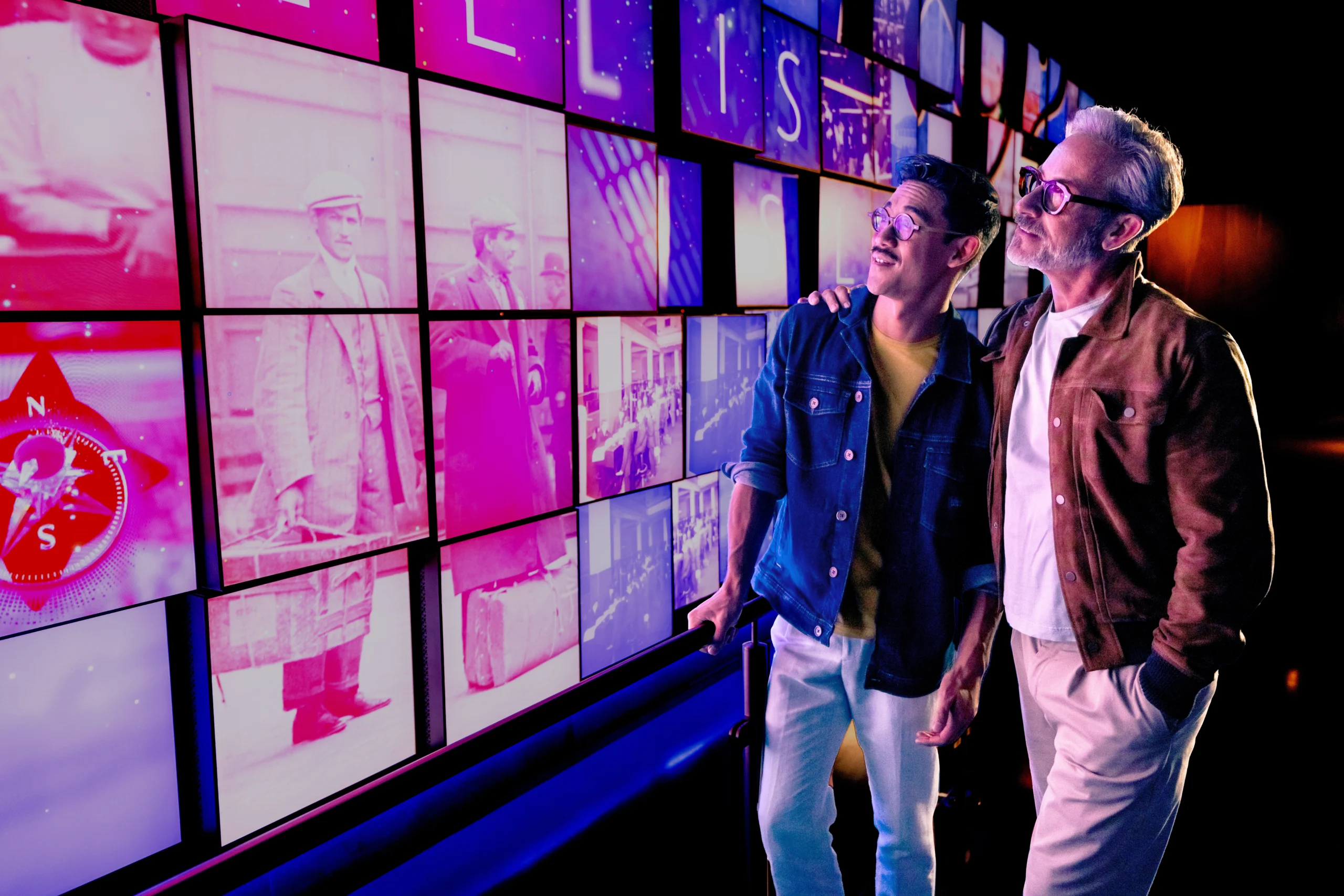 Two men looking at welcome grid in the One World Observatory during the 9/11 Memorial Walking Tour with OWO upgrade