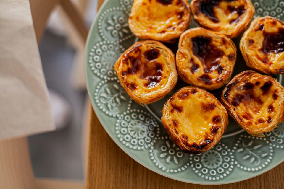 Baked Pastel de Nata on a plate during Baking Experience in Lisbon