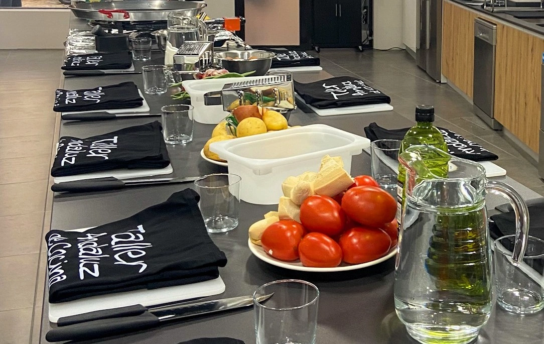 Close up of aprons and ingredients on the table