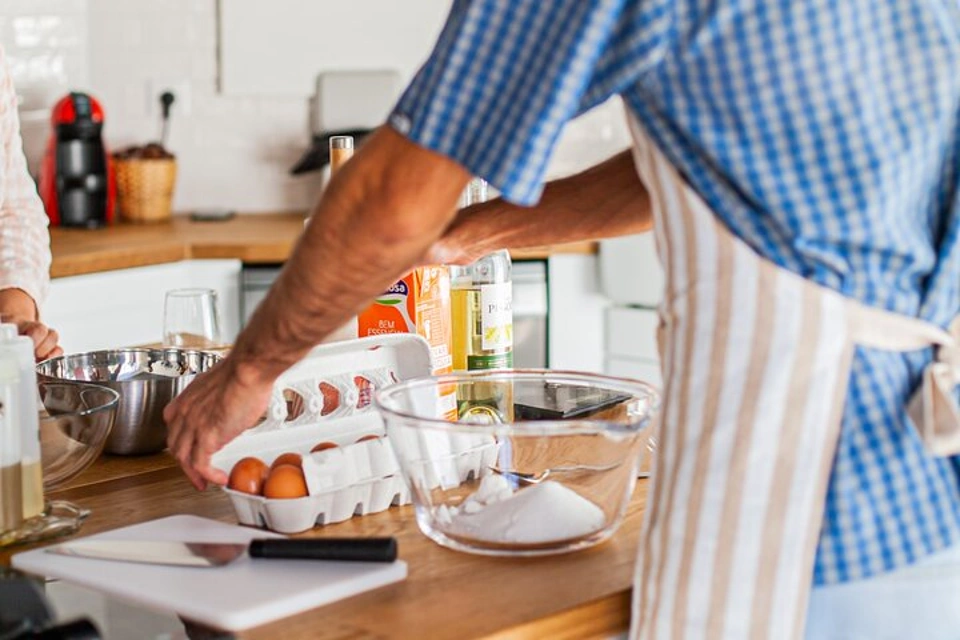 Close up of eggs and mixing bowl during Pastel de Nata Baking Experience in Lisbon