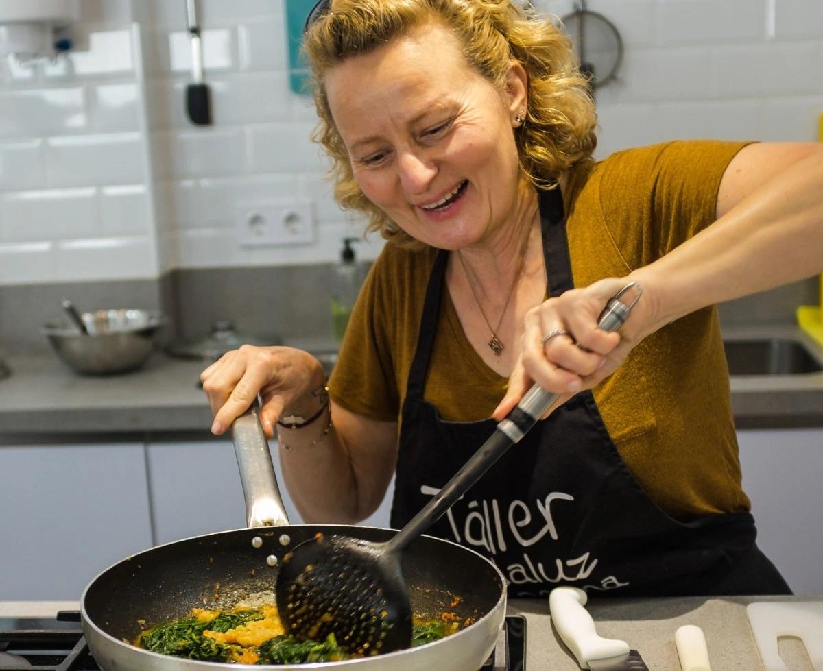 Close up of guest cooking during Spanish Cooking Class and Triana Market experience