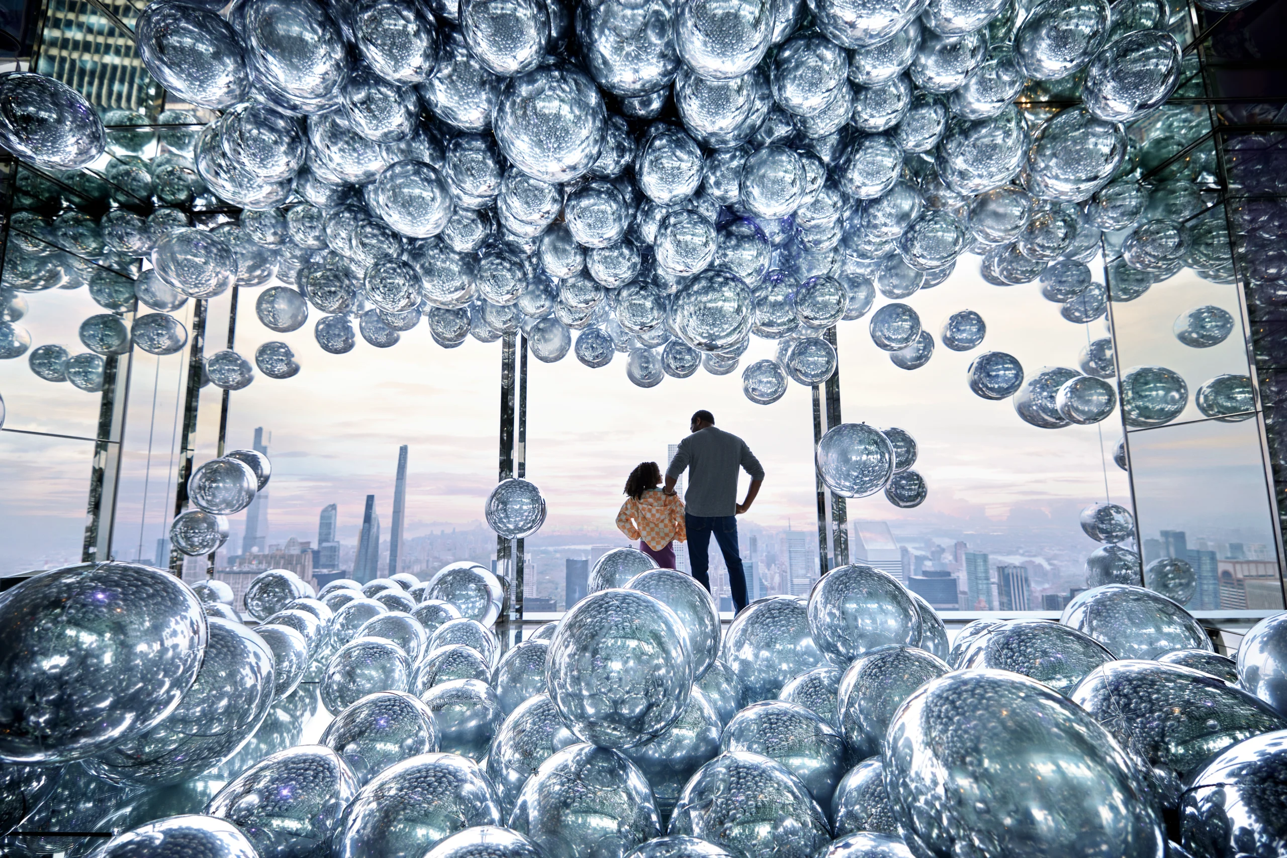 Father and daughter in The Summit One Vanderbilt in NYC