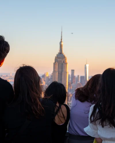 Group of tourists staring at the Empire State