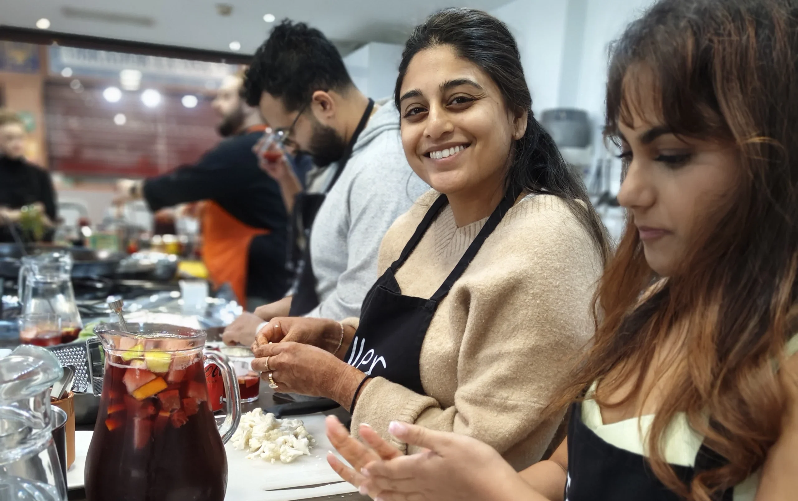 Guest posing during Spanish Cooking Class