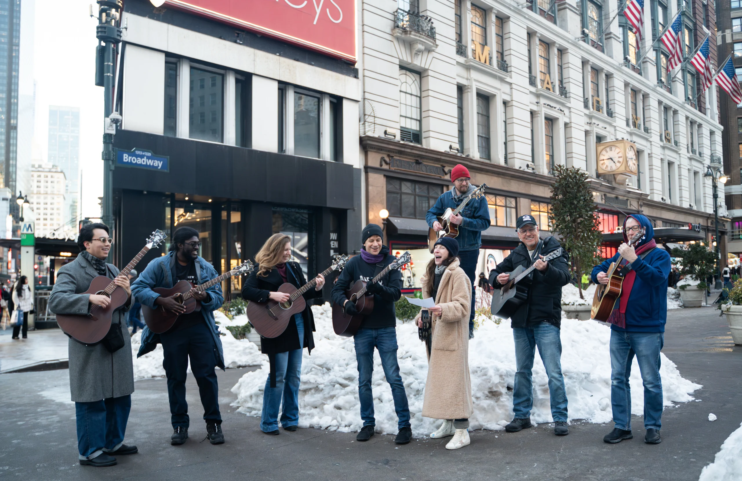 Guests busking on broadway during premium Guitar Workshop in NYC