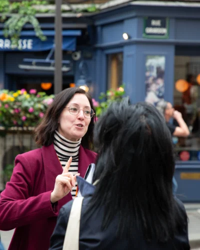 Guide in Paris explaining to guests