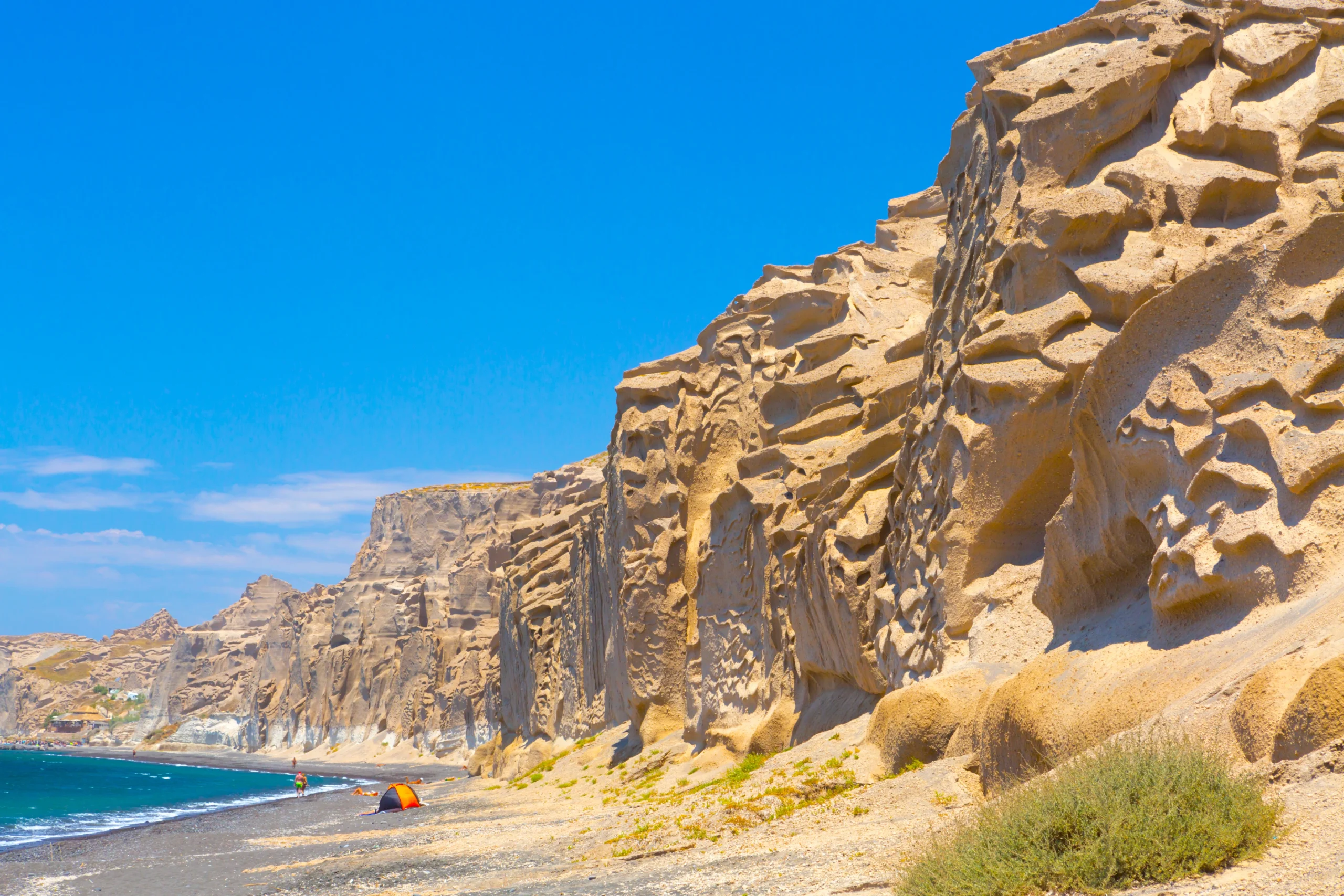 View of volcanic mountains and Vlychada beach in Santorini