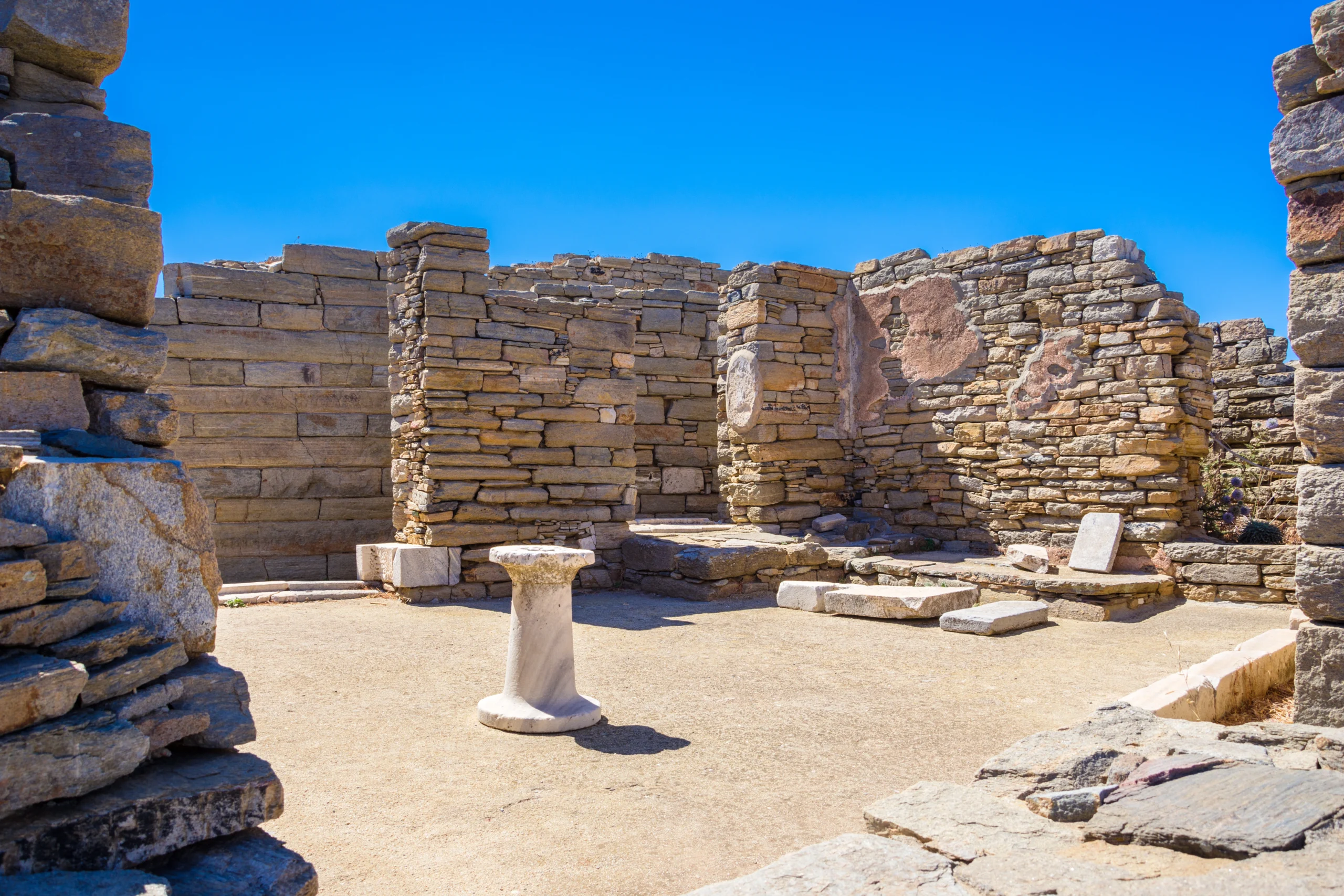 Ancient ruins in the island of Delos in Cyclades, one of the most important mythological, historical and archaeological sites in Greece