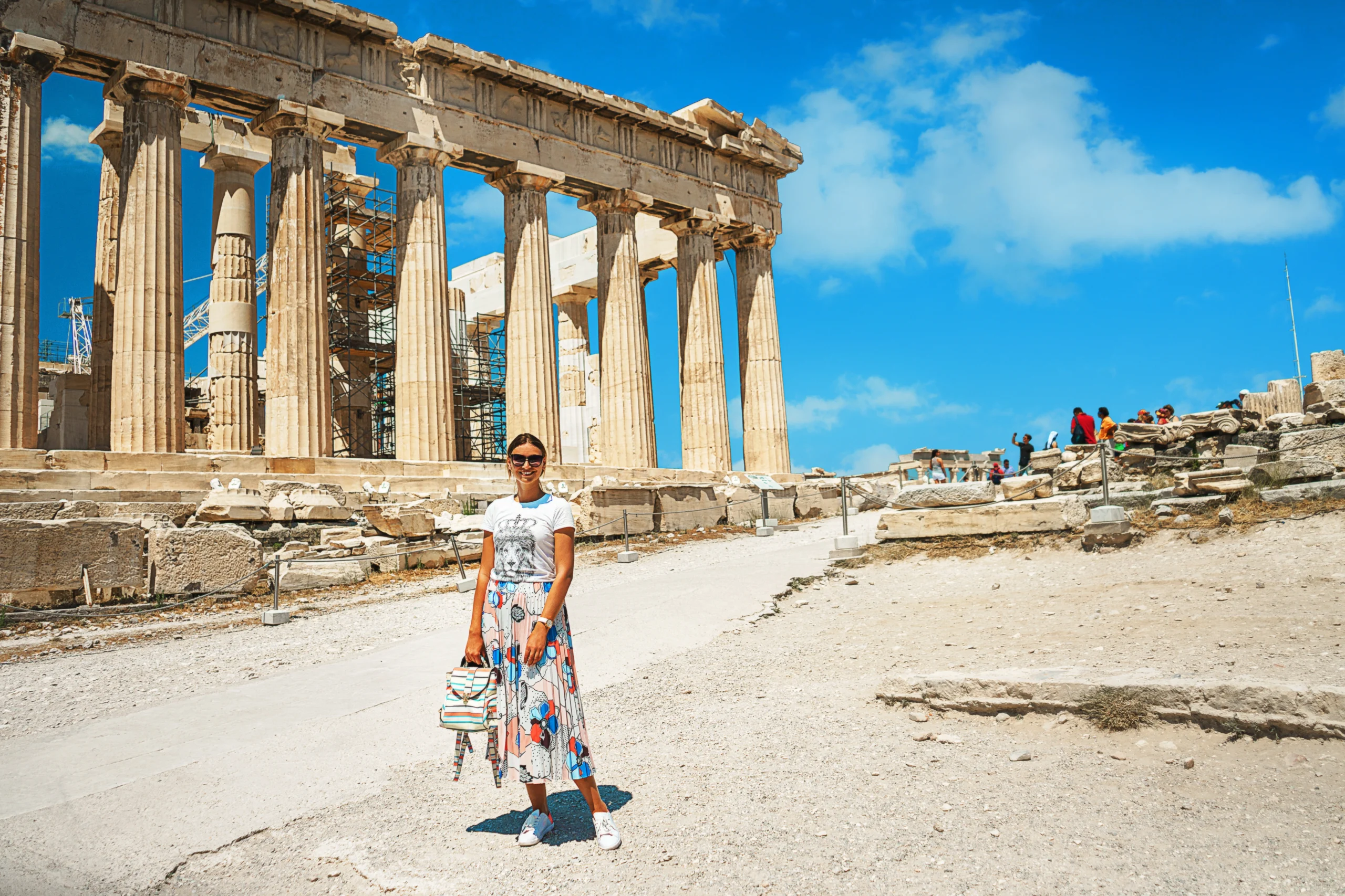 Ancient temple Parthenon in Acropolis Athens Greece and portrait of young woman during Ancient Athens premium experience