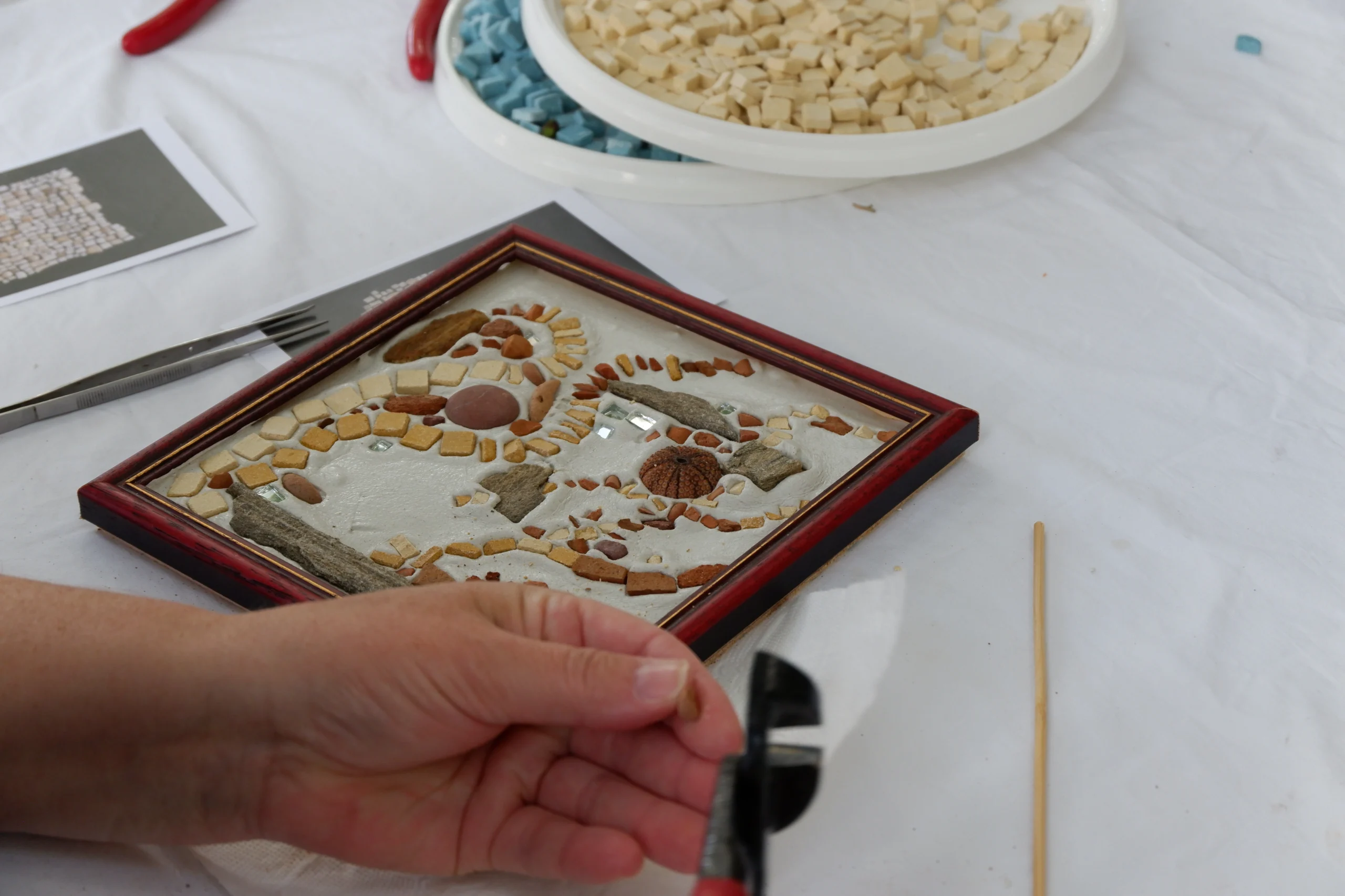 Close up of Mosaic tile in progress during Mosaic Workshop with Cycladic Artist in Mykonos