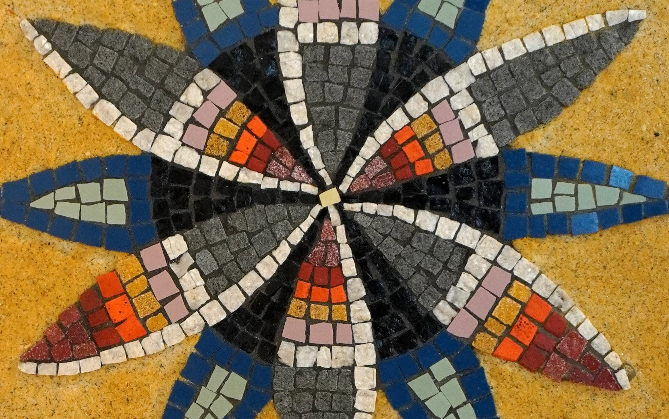 Close up of colorful mosaic tile during Mosaic Workshop with Cycladic Artist in Mykonos