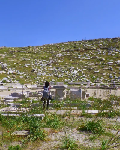 Female Traveler Visiting the Ancient Theatre of Delos, Amazing Archaeological Site on Delos Island