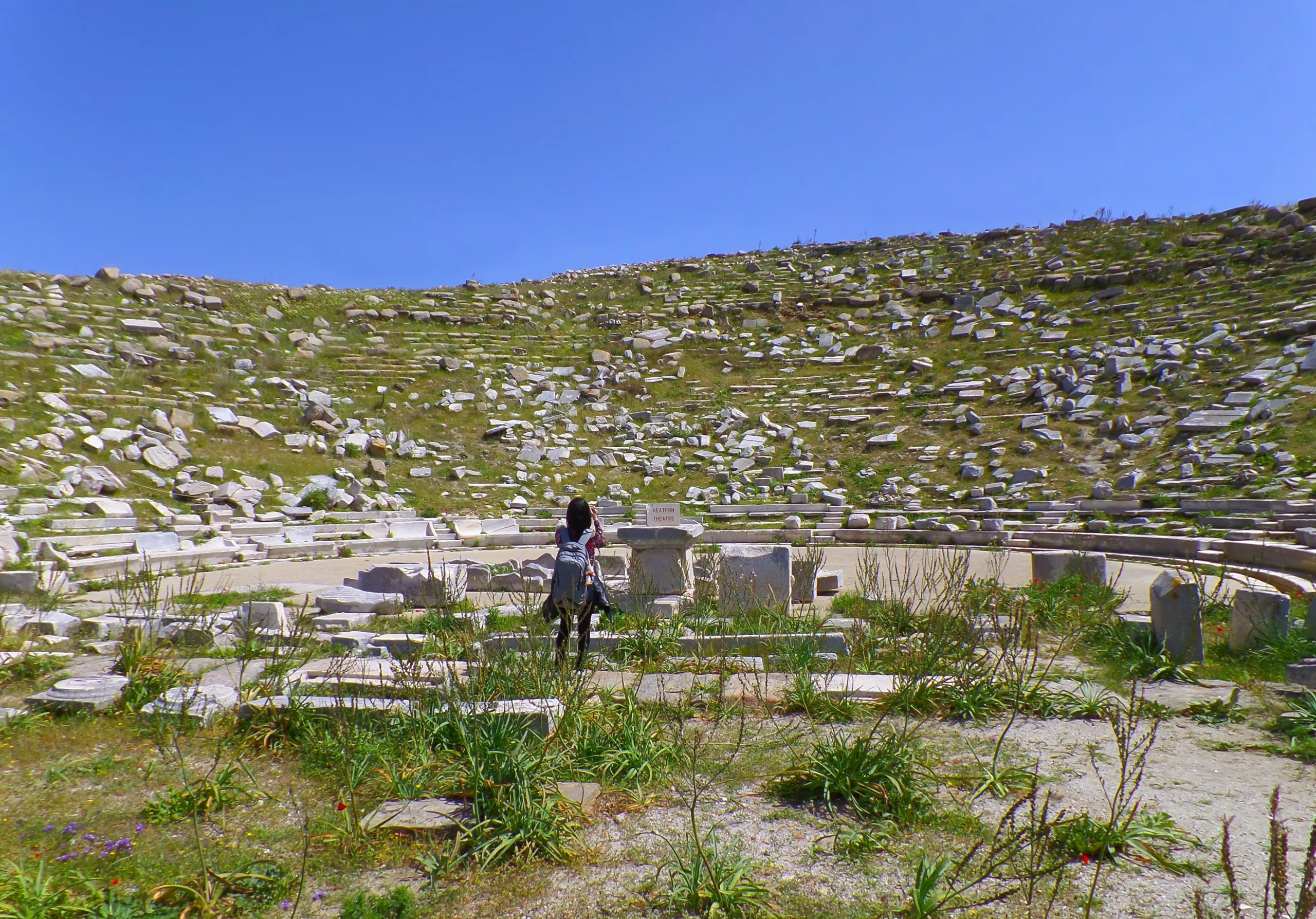 Female Traveler Visiting the Ancient Theatre of Delos, Amazing Archaeological Site on Delos Island
