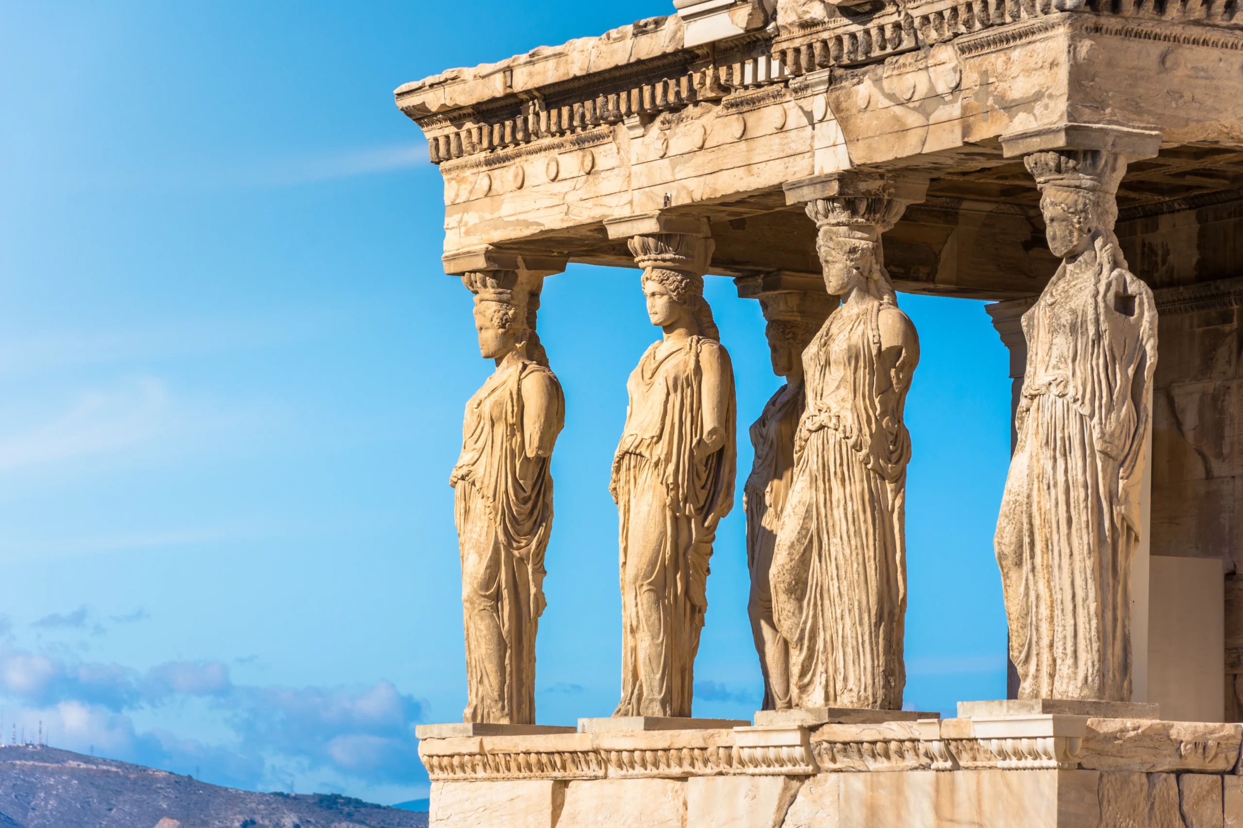 Karyatides statues, Erehtheio, on the Acropolis in Athens, Greece during Ancient Athens premium experience
