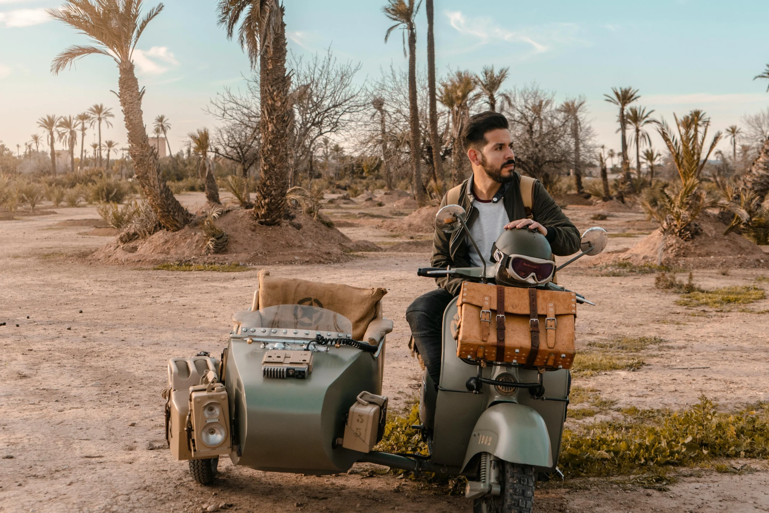 Man Riding Motorcycle With Sidecar in Marrakech during Vintage Sidecar Escape to a Lakeside Farmhouse experience