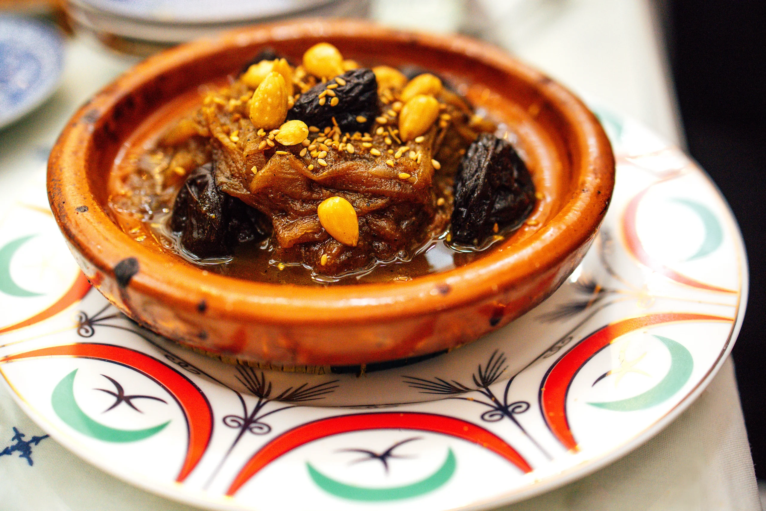 Moroccan Tagine with Raisins, Almonds and Honey during Vintage Sidecar Escape to a Lakeside Farmhouse in Marrakech