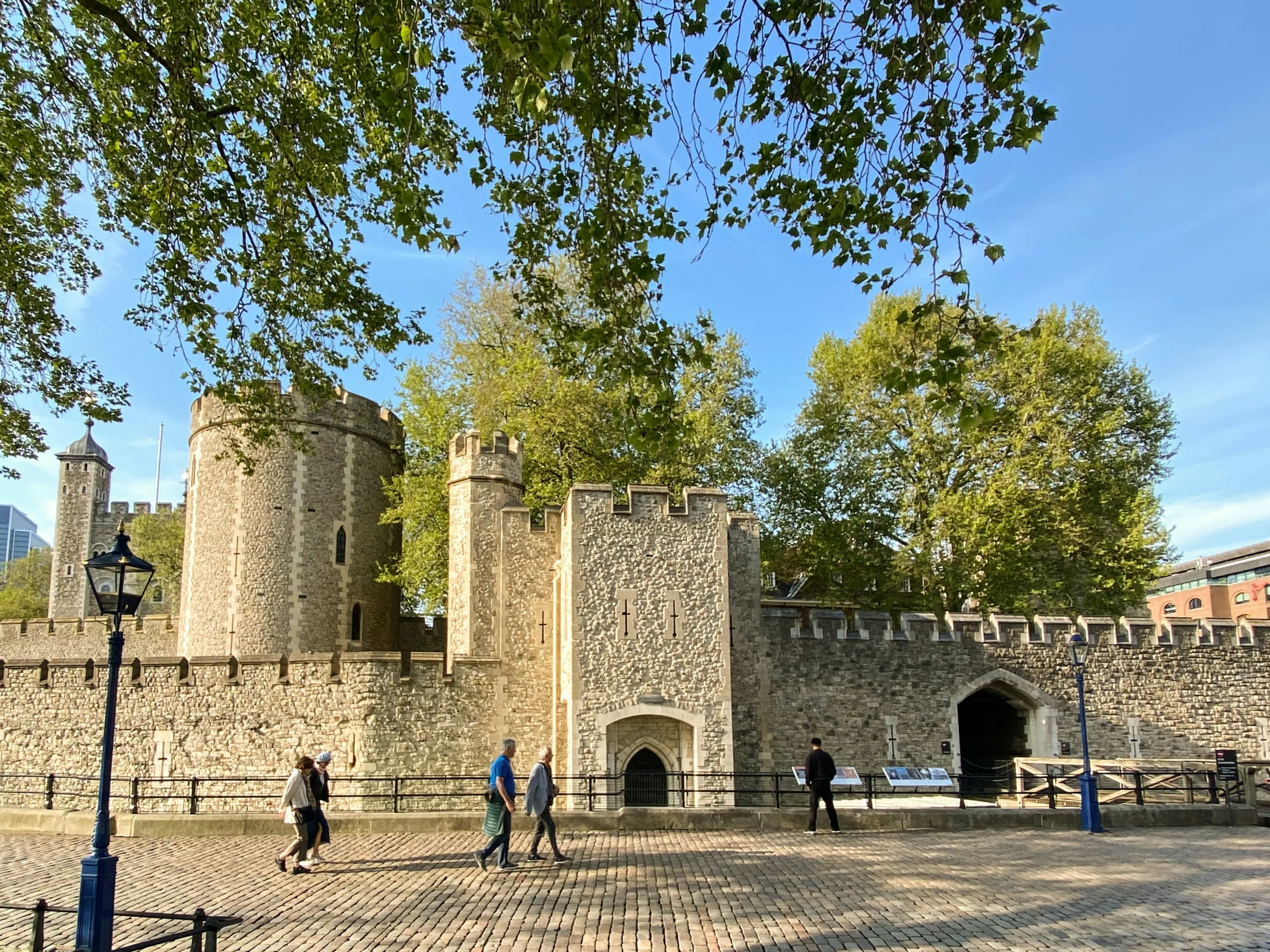People walking past the Tower of London