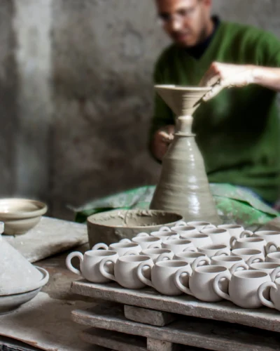 Potter Throwing a Pot in Fes Morocco during Artisan Workshops & Royal Fes Experience