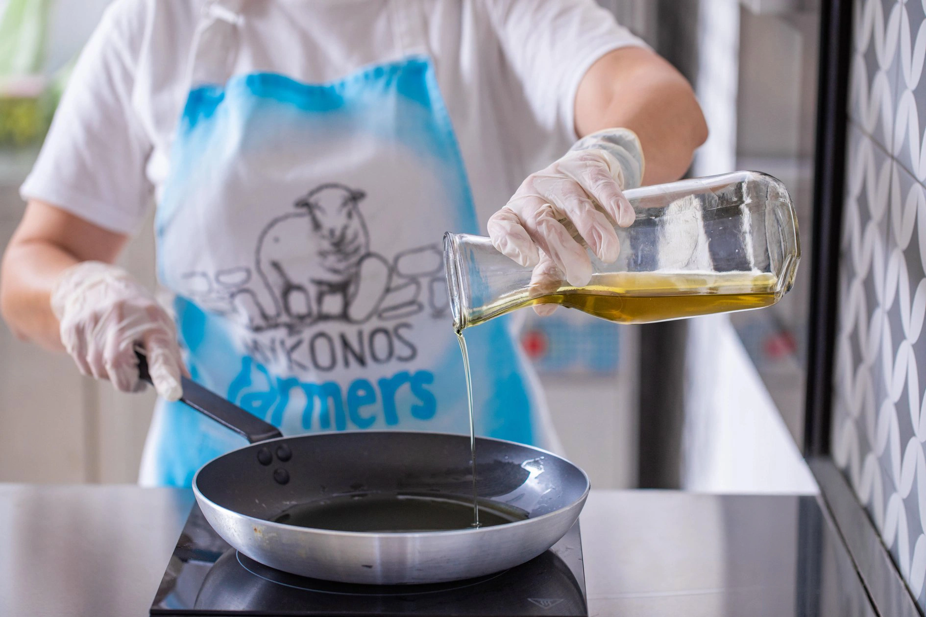 Pouring oil into pan