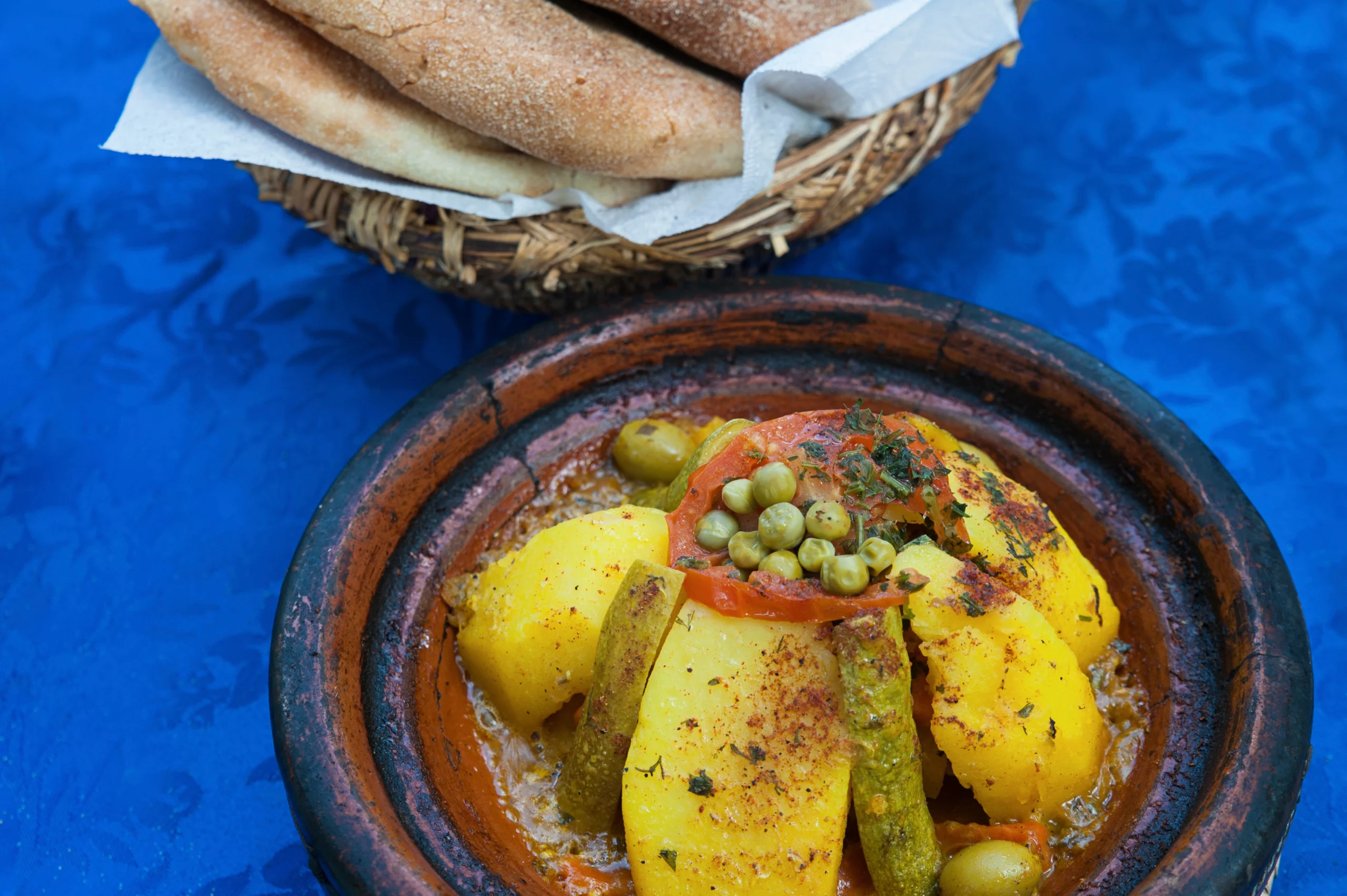 Vegetable tagine and a basket of homemade bread