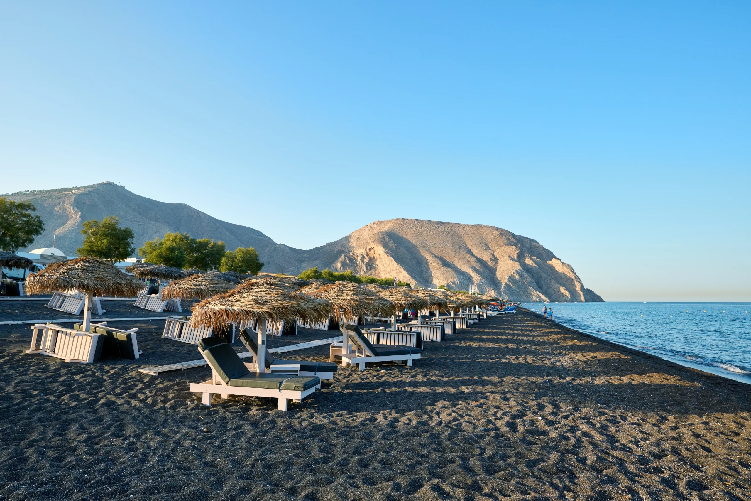 View of Perivolos black sand beach during private Santorini experience