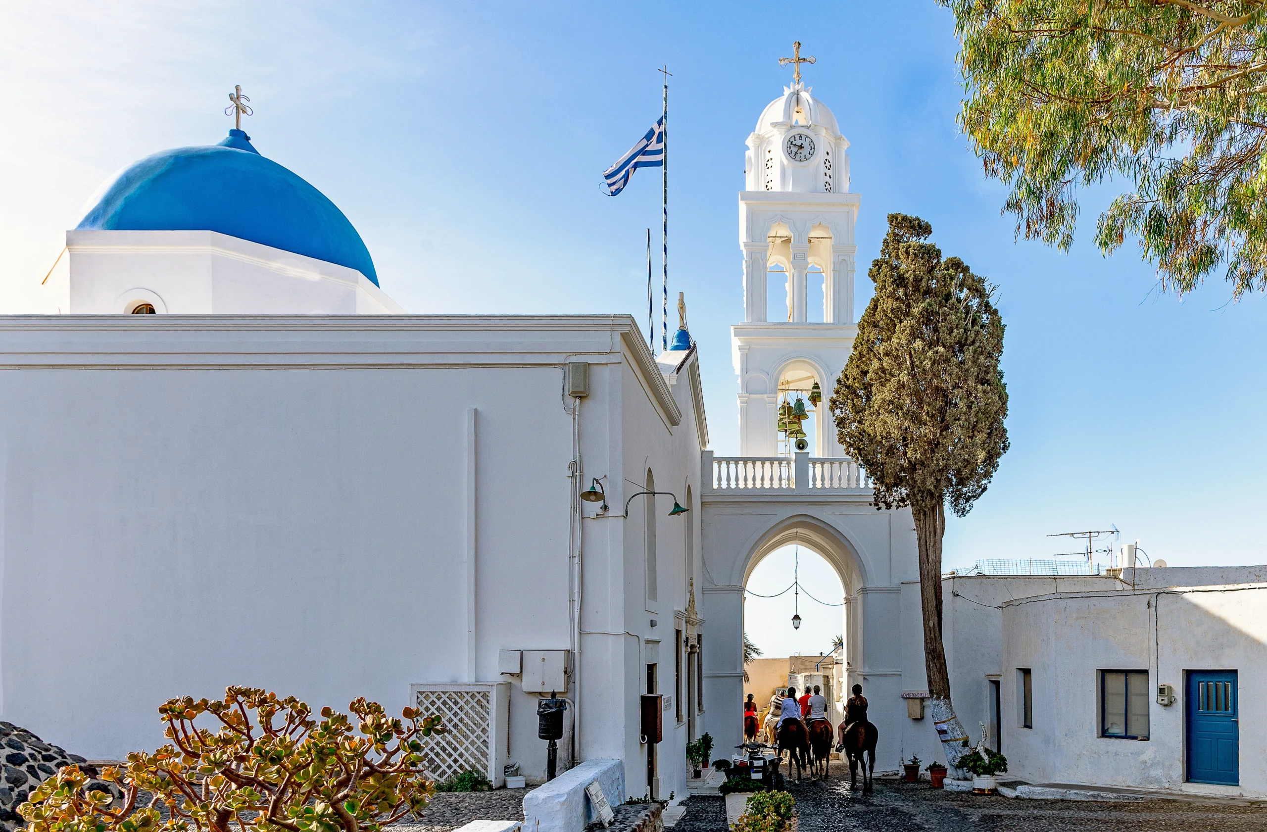 View of people in Megalochori village in Santorini