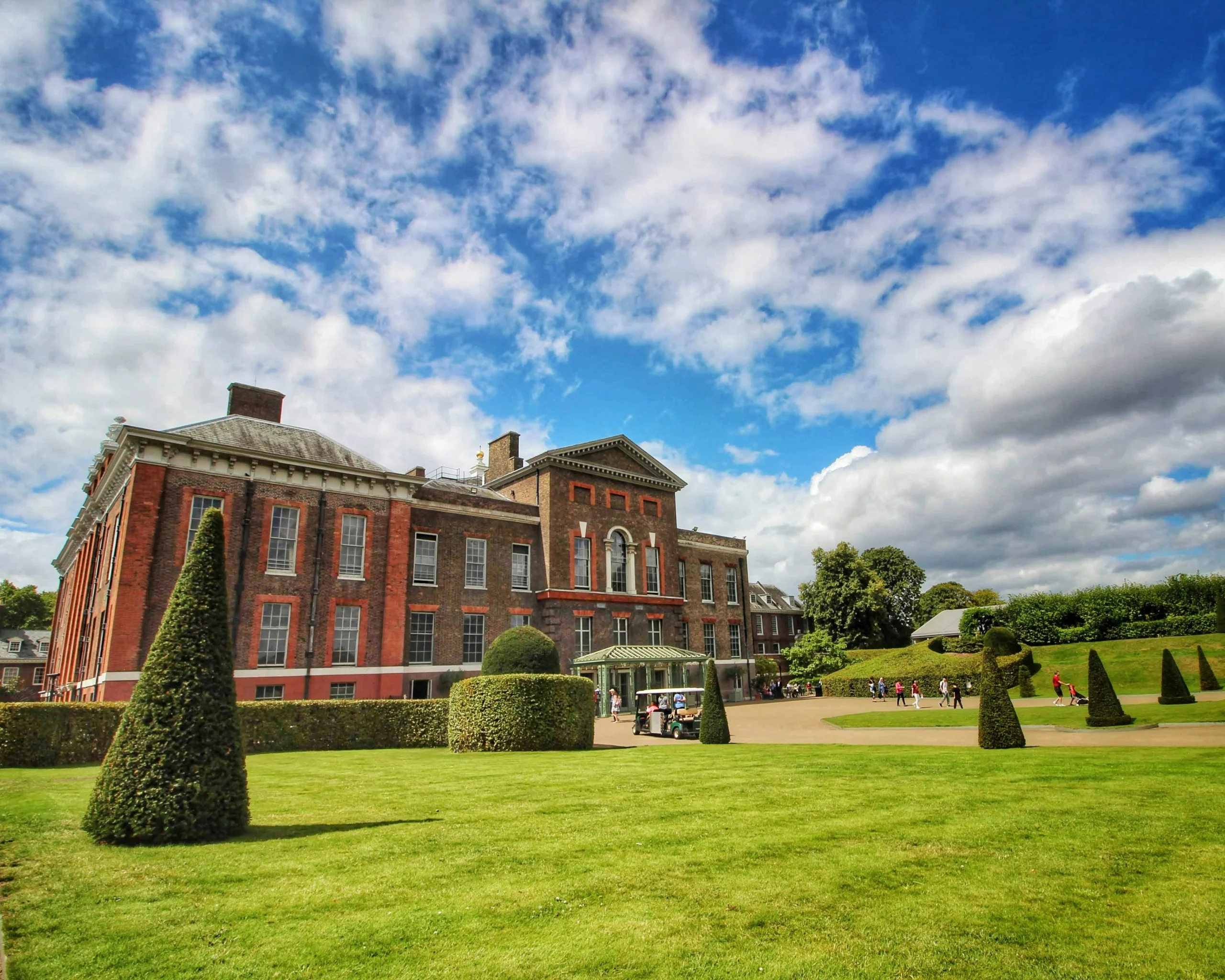 Wide shot of Kensington Palace and surrounding greenery