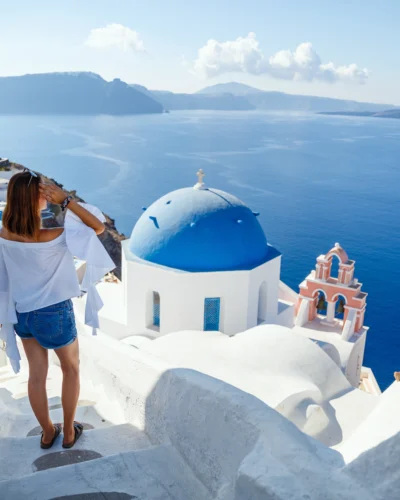 Woman admiring architecture during private Santorini experience