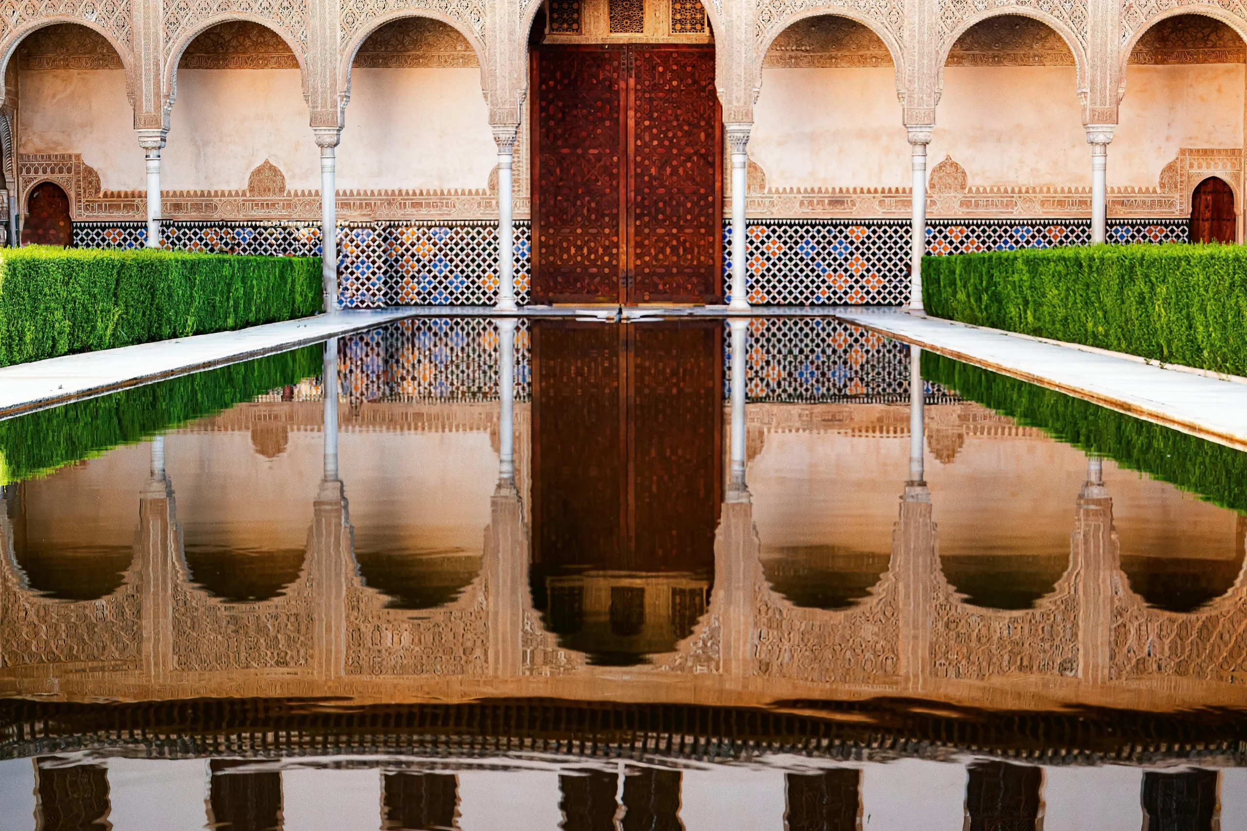 Reflection of Alhambra Palace on the Swimming Pool