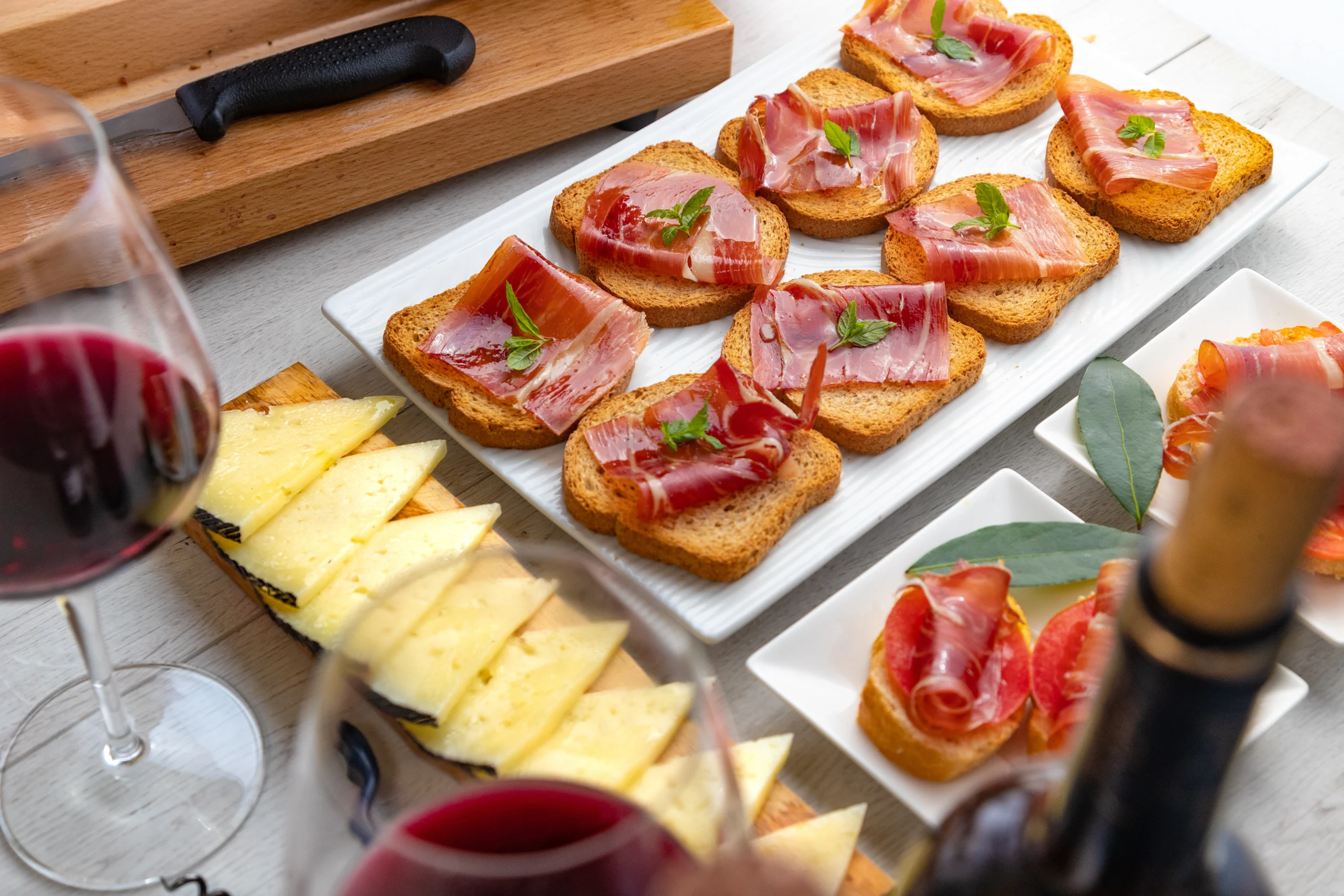 Spanish tapas with jamon and red wine during Madrid by E-Bike experience